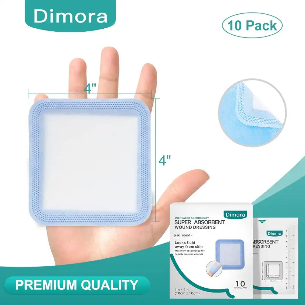 Super absorbent wound dressing 4x4 inches with blue edge, 10 pack, shown on hand for scale